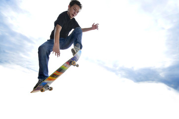 Boy practicing skate in a skate park