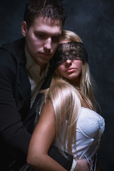 young couple in love, studio dark