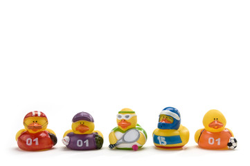 5 rubber ducks with sports outfits