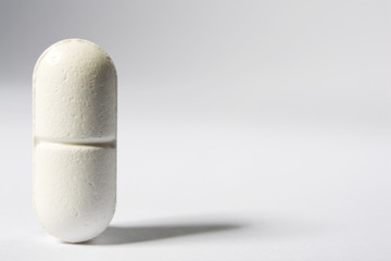 A single pill standing up