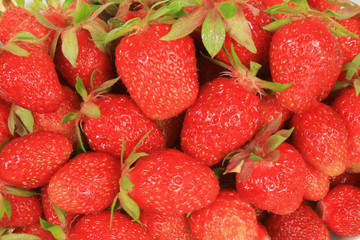Strawberry fruit background. Red, tasty texture.