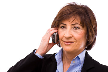 Senior businesswoman calling on mobile phone