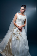 Fototapeta na wymiar Studio portrait of mature caucasian bride