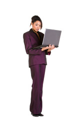 Young confident businesswoman using a laptop computer