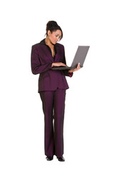 Young confident businesswoman using a laptop computer
