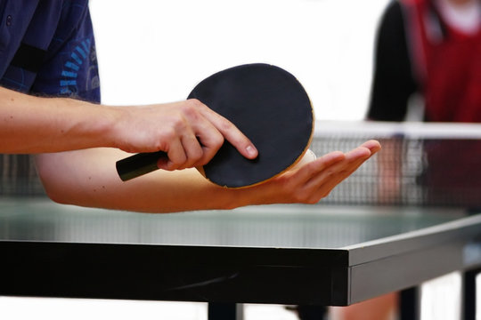 Table Tennis Player Serving