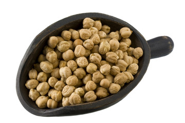 chickpea (garbanzo bean) on a rustic, wooden scoop
