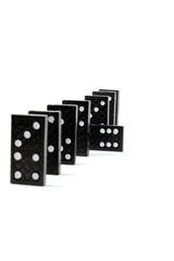 row of dominoes including a special domino stone isolated