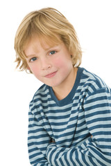 Studio shot of a young blond haired blue eyed boy