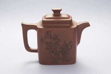 Chinese teapot on the white background