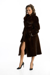 Young attractive woman in fur coat