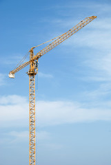 building crane over blue sky background