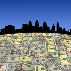 Philadelphia skyline with American dollars foreground