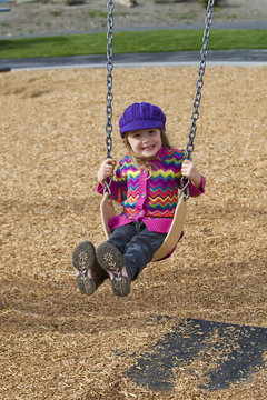 Child On Swing Set