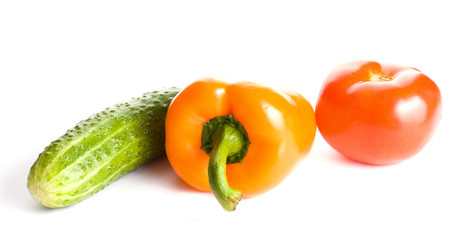 Fototapeta na wymiar Cucumber, pepper and tomato isolated on white