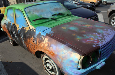 Graffiti on an old car