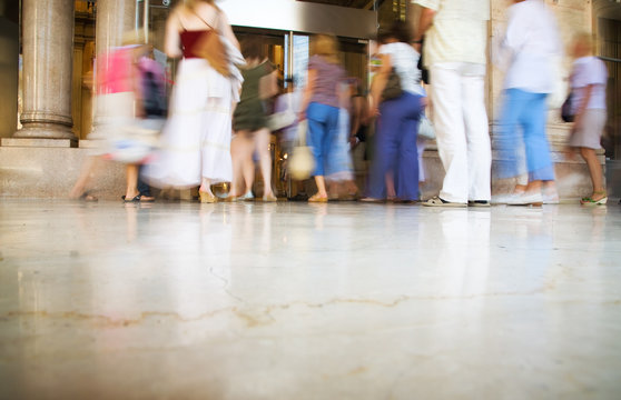 People Entering Into Modern Shop. Blurred Motion.