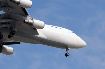 Heavy jumbo jet descending for landing