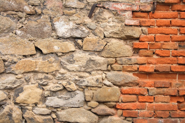 old wall texture from the red bricks and stones