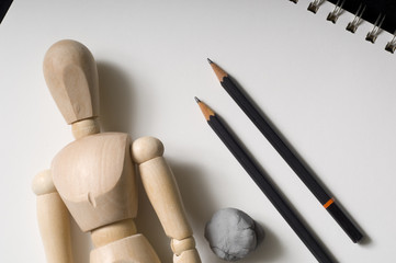 Drawing supplies including a wooden poser, pencils