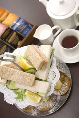 An arrangement of sandwiches and scones for afternoon tea