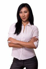 Attractive Asian woman wearing white blouse and grey slacks