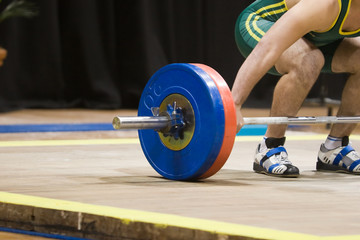 A weightlifter about to lift