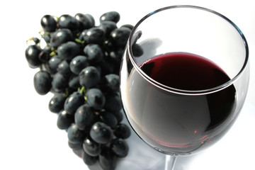 Red wine with grapes