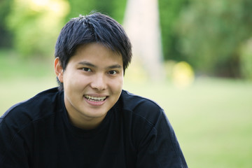 A headshot of an asian college student