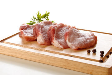 Prepared slices of fresh pork meat with parsley