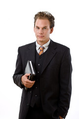 Handsome businessman holding notebook,