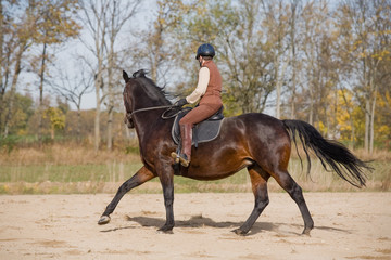 Woman Riding Horse