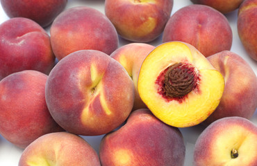 slice fresh peaches on white background