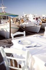 Fototapeta premium greek island taverna harbor classic greece fishing boats