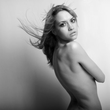 Portrait of nude elegant woman. Fashion photo