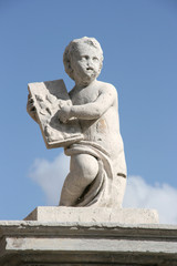 Fototapeta na wymiar Angel statue next to Leon cathedral in Castilla y Leon, Spain