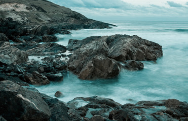 Fototapeta na wymiar great moody image of soft water on rocks