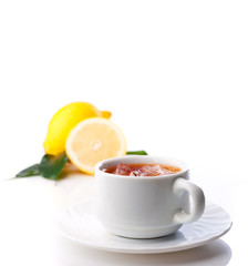 cup of ice tea with lemon
