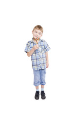 Little boy with lolipop (isolated on white)