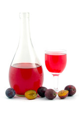 wine and  plums isolated on white