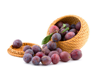 Still-life with plums isolated on white background