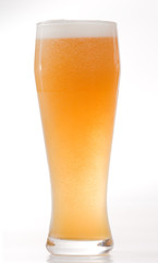 Full glass of beer. On a white background