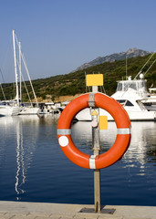 a life buoy at a yacht port