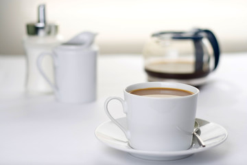 a cup of Espresso coffee isolated over white