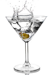 Olive splash into cocktail on white background