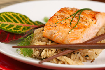 Healthy Dinner of Grilled Salmon on Bed of Rice