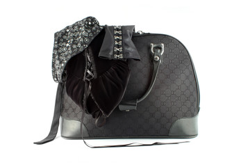 Naklejka premium small suitcase with sexy velvet and skull print gothic clothing