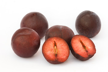 Plums isolated on white background