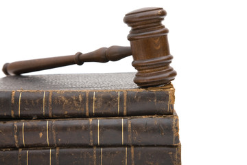 legal concept with old gavel and law books