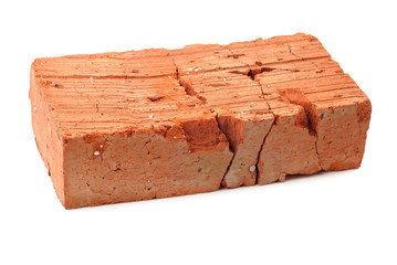 Cracked red brick isolated over white background